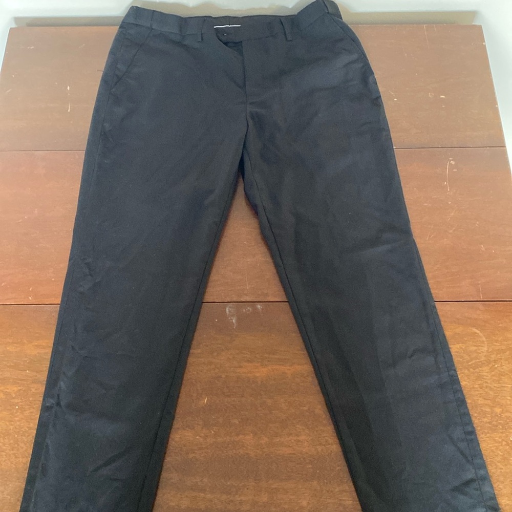 Large men’s black dresss pants.